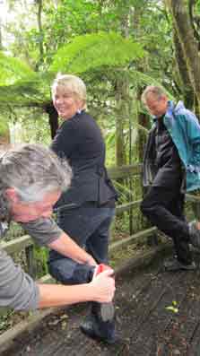 Associate Conservation Minister Nicky Wagner is getting her boots cleaned at a cleaning station in Puketi Forest to prevent the spread of kauri dieback (PTA). 
