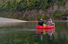 Paddling down the Whanganui River. 