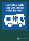 Sign for camping with self contained vehicles only. 
