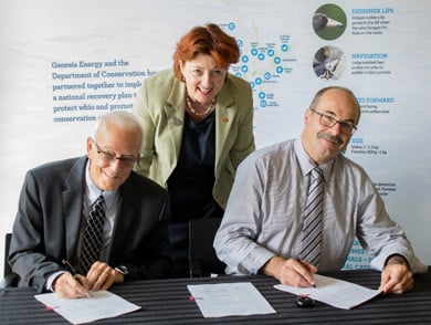 Genesis Energy CEO Albert Brantley and DOC Director General Lou Sanson signing the new agreement with Minister of Conservation the Hon Maggie Barry.