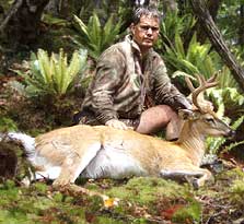 Hunter with white-tail deer. 