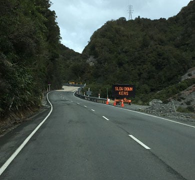 Slow down kea sign. 