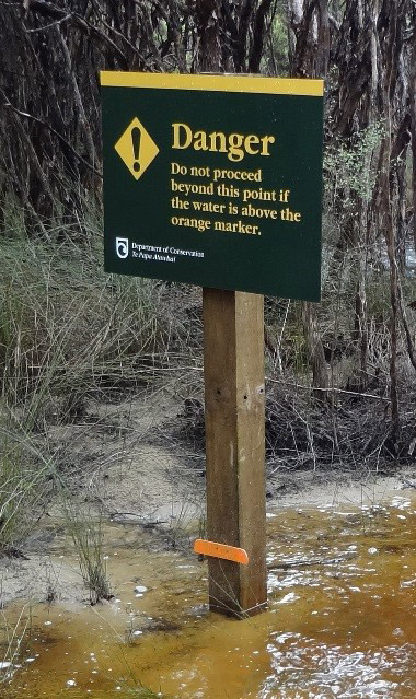 Flood sign with orange marker