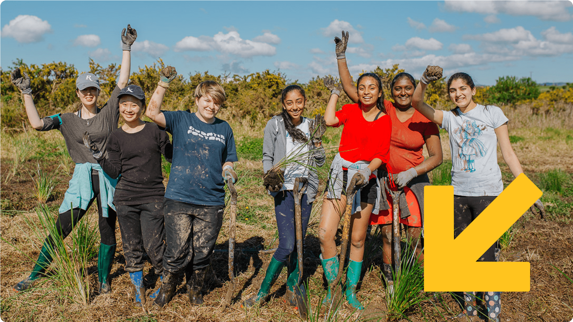 Teenagers and young adults at a tree planting.