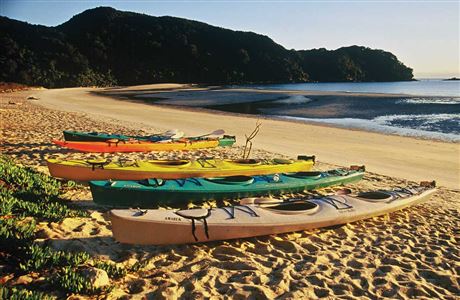 Kayaks on beach. 