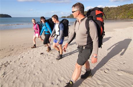 Trampers on Maori Beach.