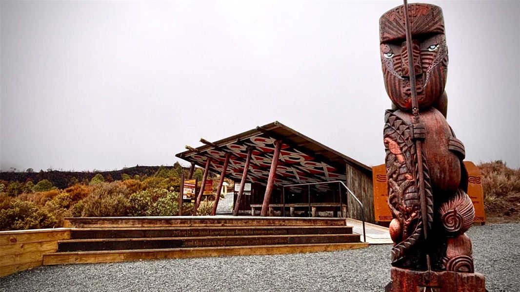 Pou Te Ririo at the start of Tongariro Alpine Crossing and the shelter at the start of the track.