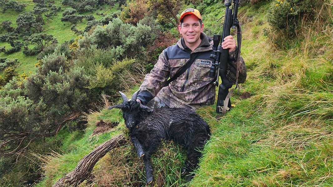 Minister James Meager participating in the National Wild Goat Hunting Competition. 