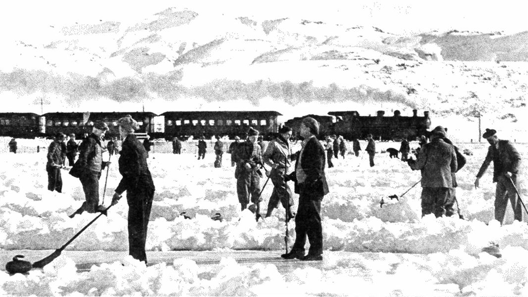 Curlers at Oturehura in the 1930s with train in background. 