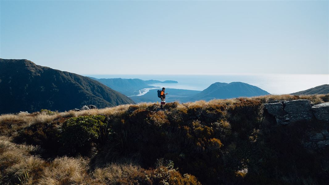 Ranger Heath Sinclair contacting home base about successful kiwi egg lift. 