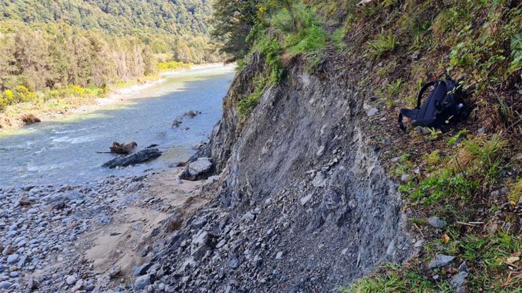 damage on the Waitahu Track, where the river has eaten into the track.  
