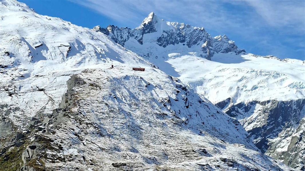 French Ridge Hut in the distance during wintertime. 